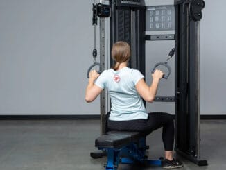 Rep Fitness REP FT-3000 Compact Functional Trainer with a user 6