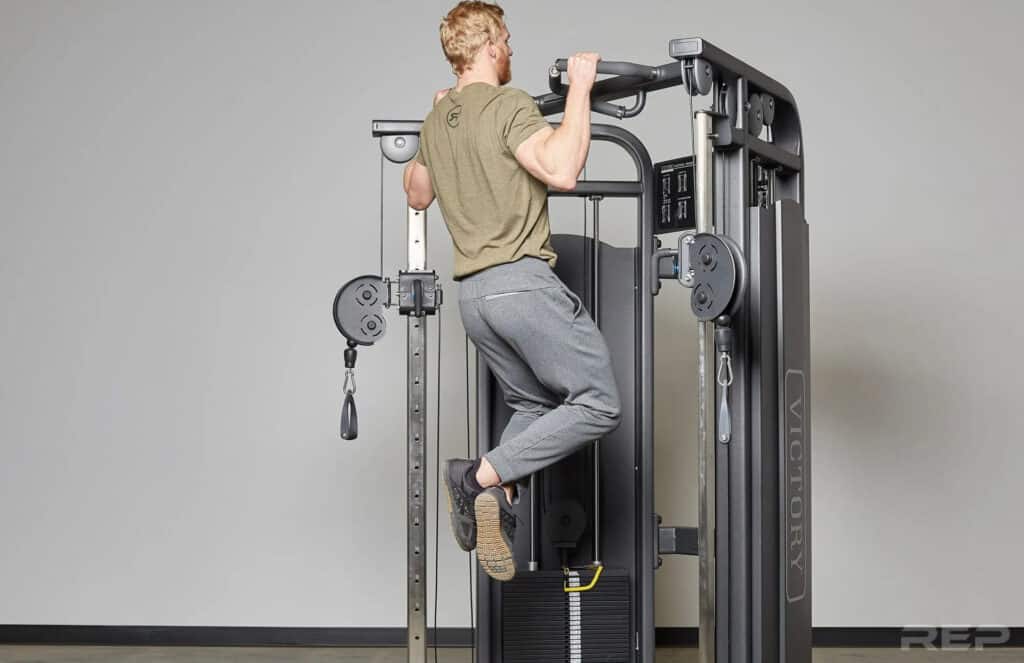 Rep Fitness REP FT-5000 Functional Trainer with a user 2