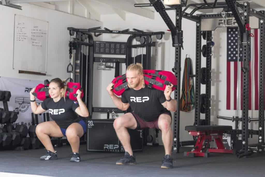 Rep Fitness Sand Bags squats