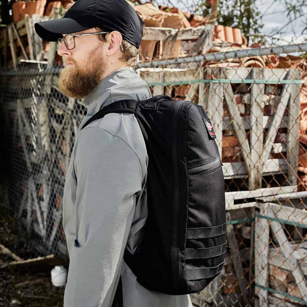 GORUCK Bullet Rucker 15L worn.  The Bullet Rucker is simple, streamlined, and rugged. It is ruck plate compatible and is perfect for everyday rucking or adding weight to your day trip. This ruck is made from 500D CORDURA® with 210D HT CORDURA® to deliver zero irritation when rucking shirtless.
