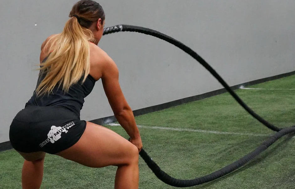 Rogue Fitness Battle Rope with an athlete